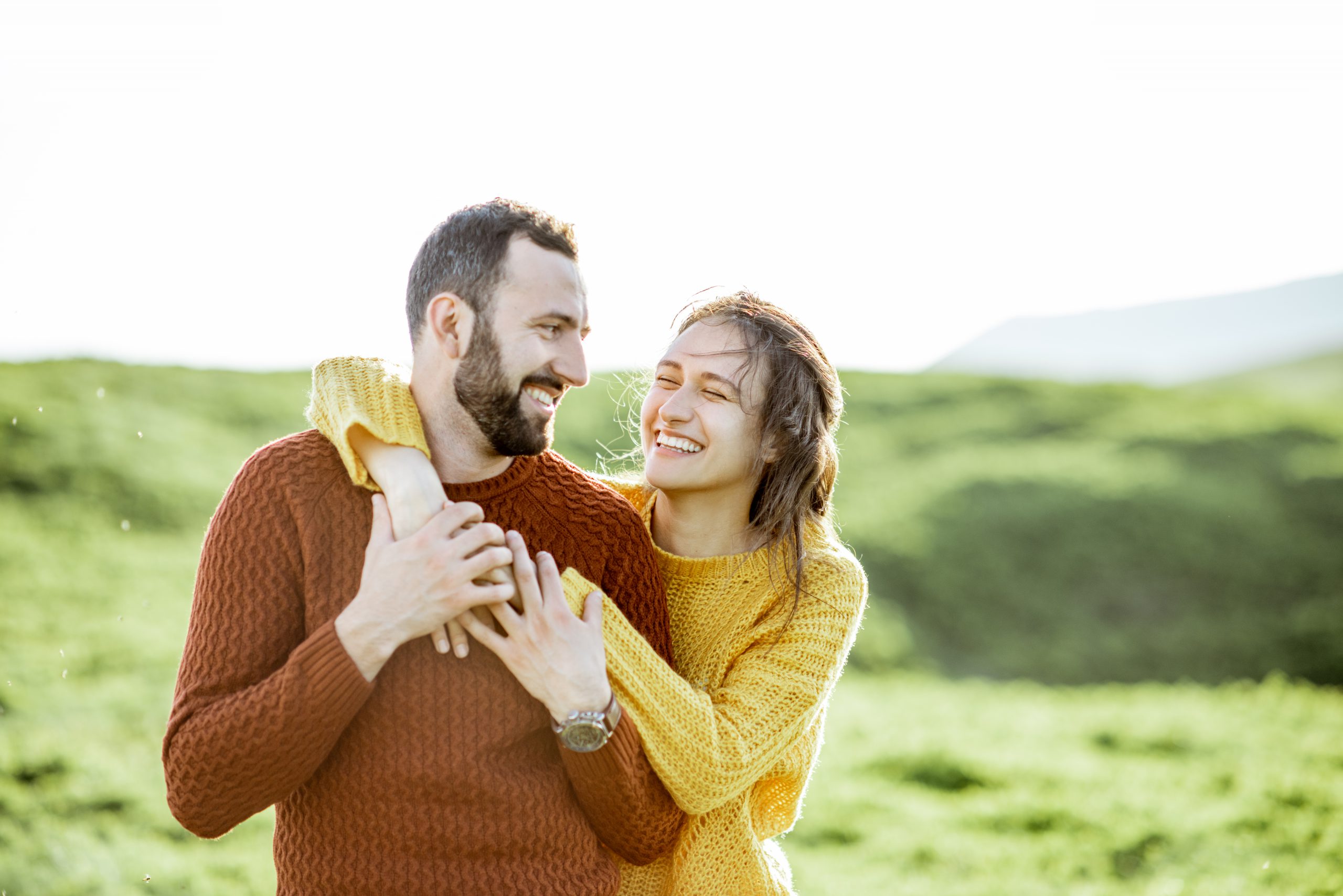 A loving, happy couple on outdoor