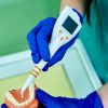 Instructions of how gum disease is treated on model